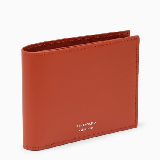 Terracotta-coloured leather bi-fold wallet with logo
