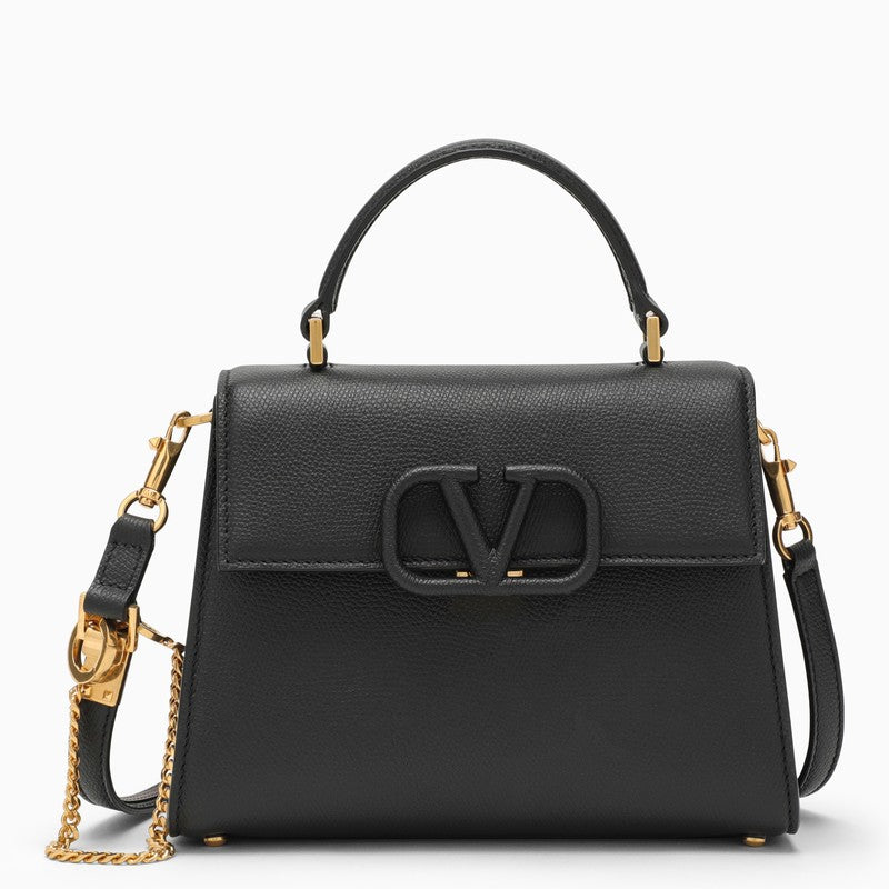 Black Vsling handbag in garnet calfskin