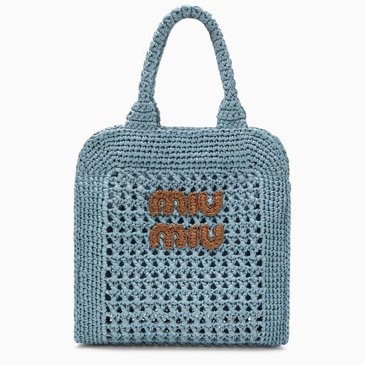 Light blue straw handbag