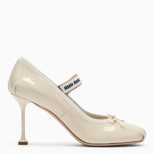 Ivory patent leather pumps