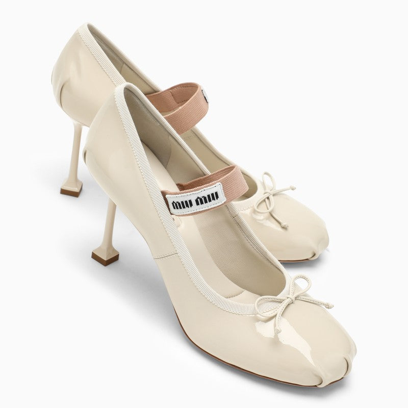 Ivory patent leather pumps