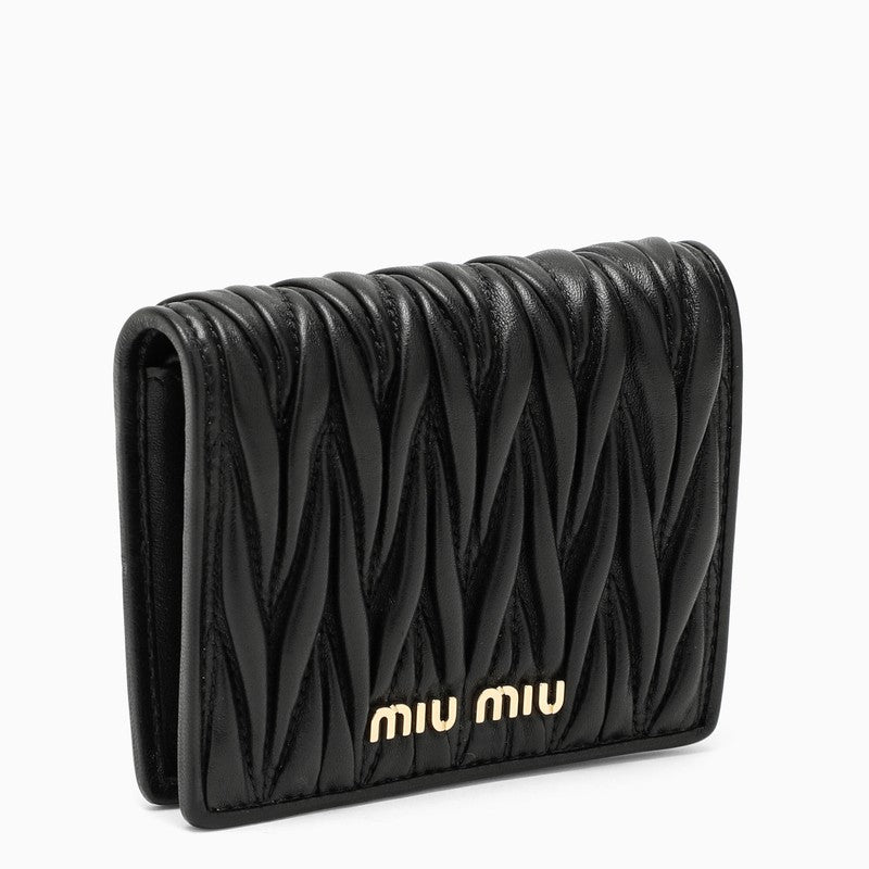 Black wallet in matelassé Nappa leather