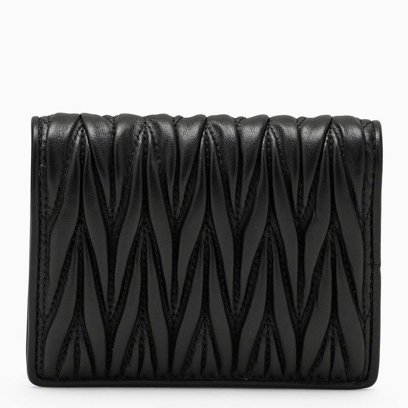 Black wallet in matelassé Nappa leather