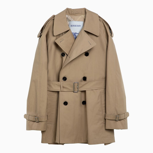 Short double-breasted beige trench coat with belt