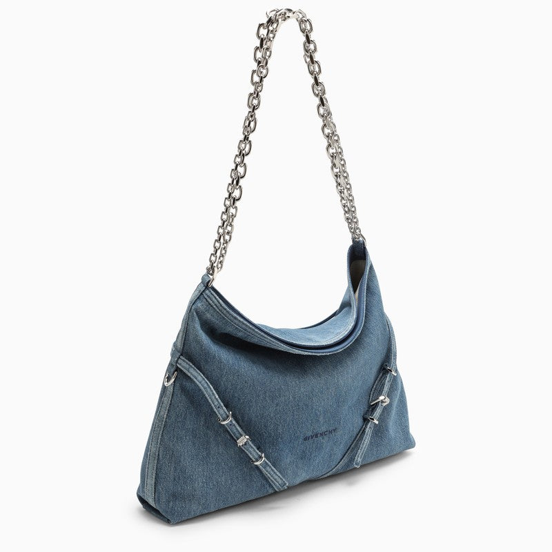Medium Voyou Chain bag in blue denim