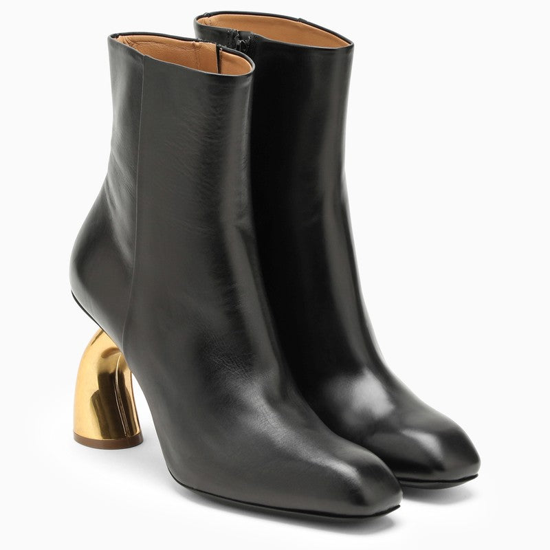 Black ankle boot with designer heel