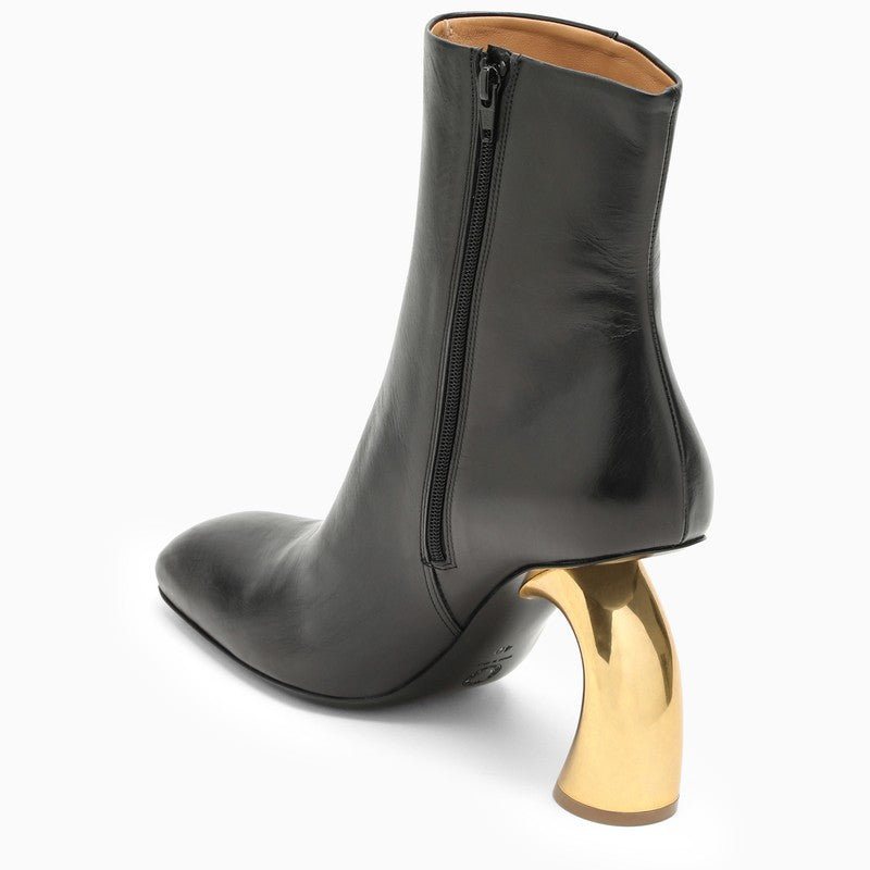 Black ankle boot with designer heel