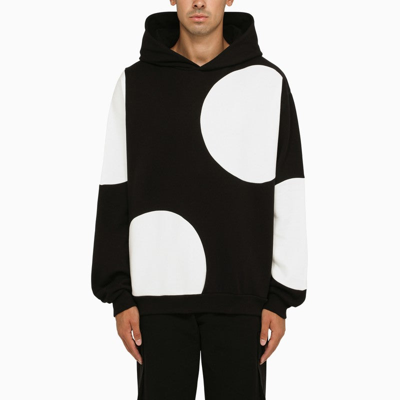 Black and white sweatshirt with maxi polka dots