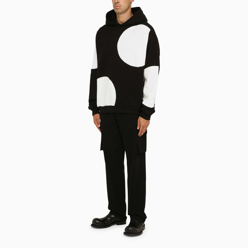 Black and white sweatshirt with maxi polka dots