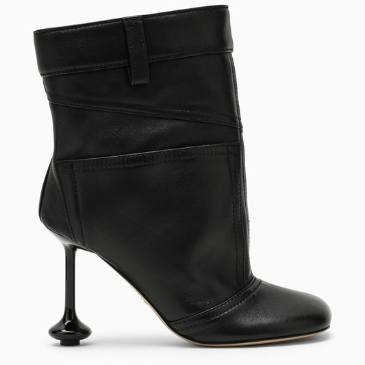 Toy black leather boot