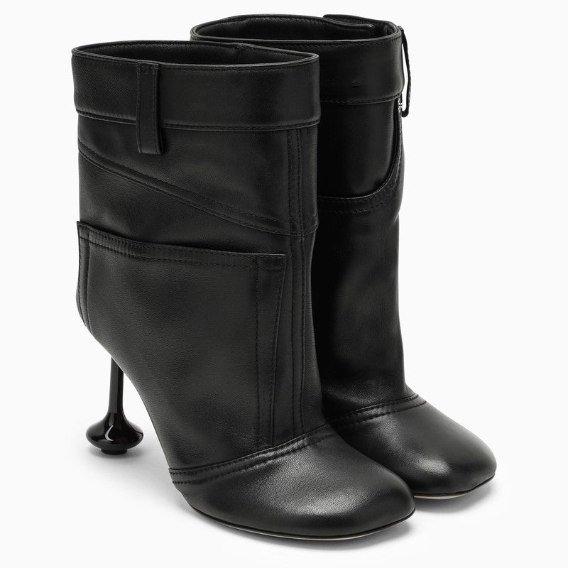 Toy black leather boot