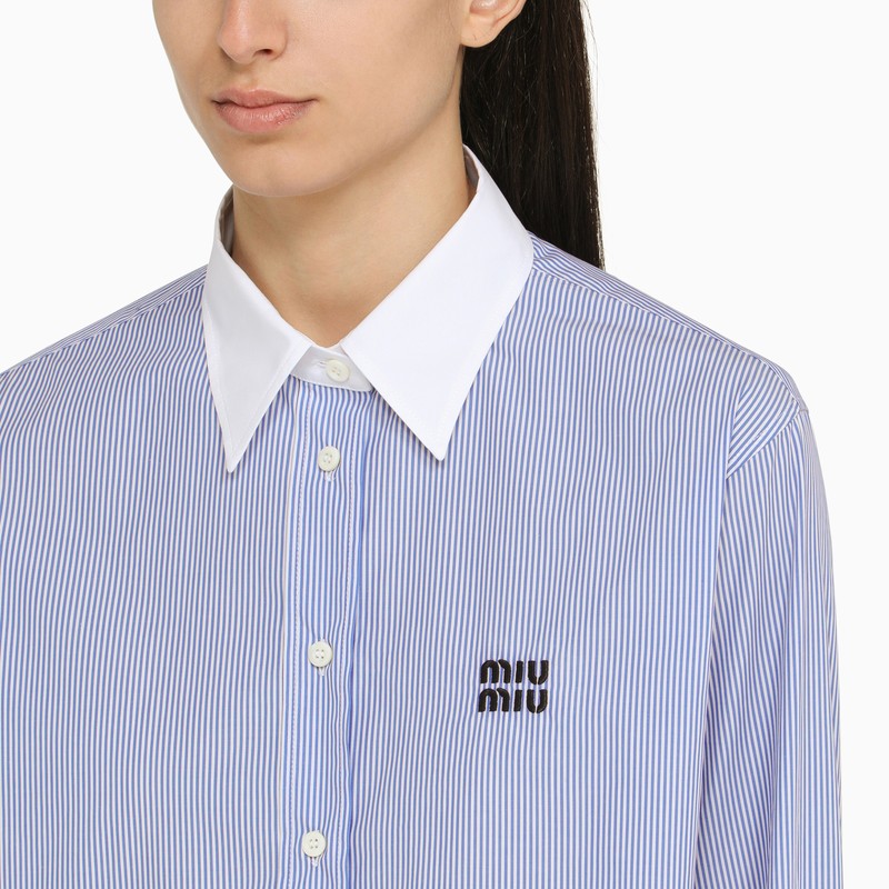 White/ blue striped shirt with logo