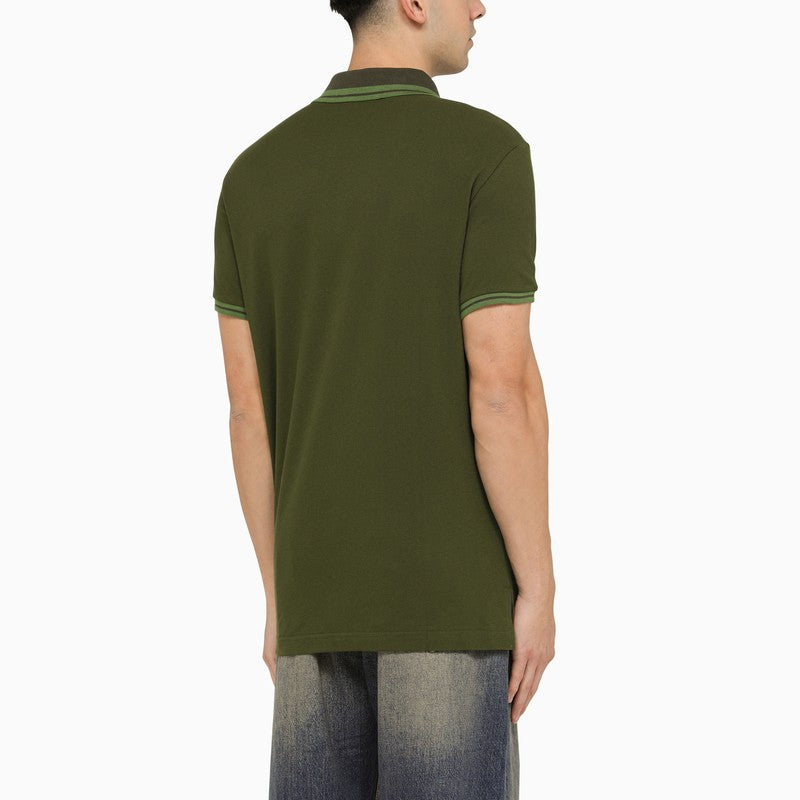 Green short-sleeved polo shirt with logo embroidery