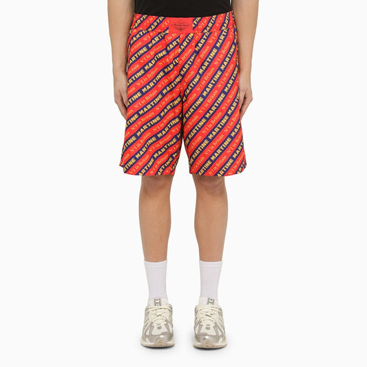 Red Bermuda shorts with logo print
