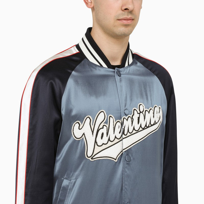 Blue and dark blue bomber jacket with logo patch