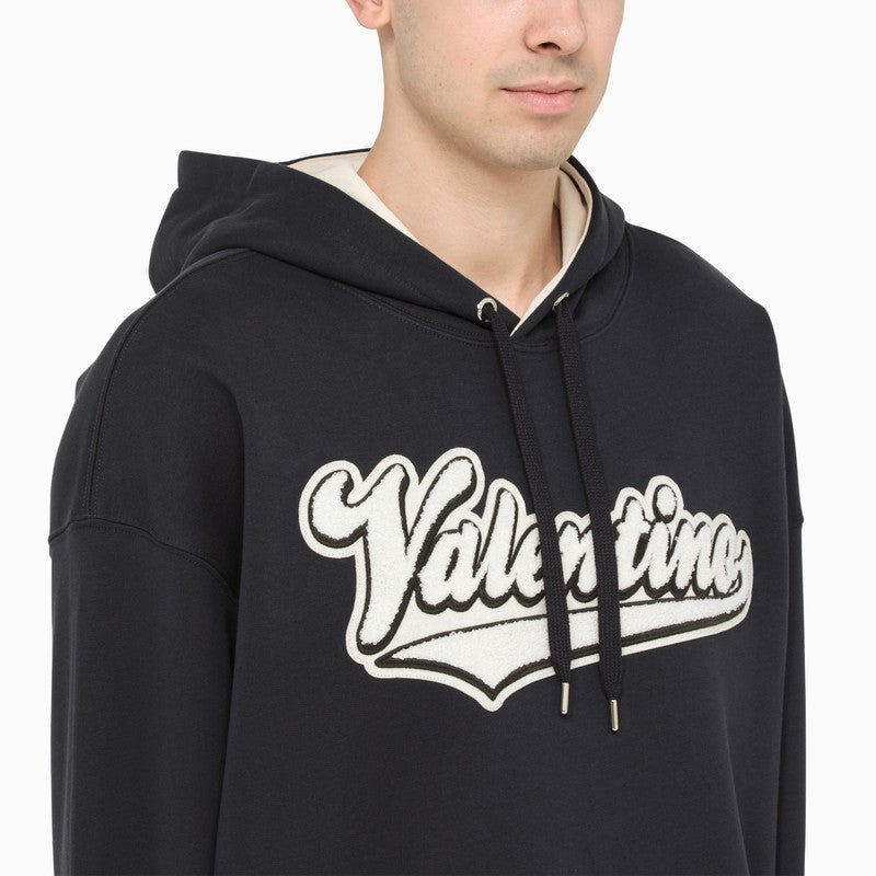 Navy hoodie with logo patch