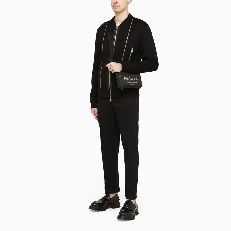 Black zip-detailing trousers