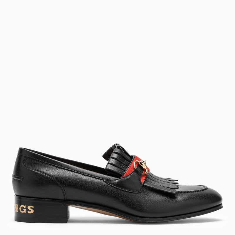 Leather loafers with horsebit and fringes