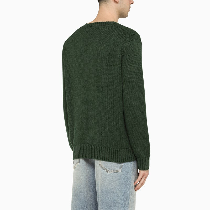 Green crew-neck sweater with inlay