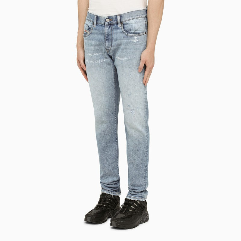 Light blue slim jeans with worn