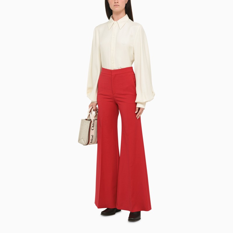 Wide red bell-bottom trousers