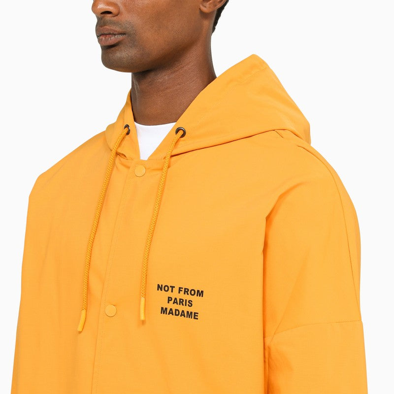 Yellow ochre single-breasted duster coat with slogan