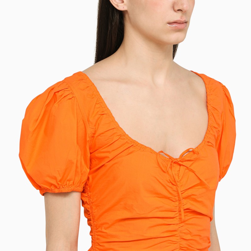 Orange draped dress